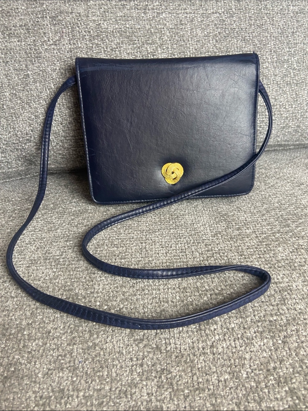 Bueno Navy Crossbody Bag with Gold Emblem